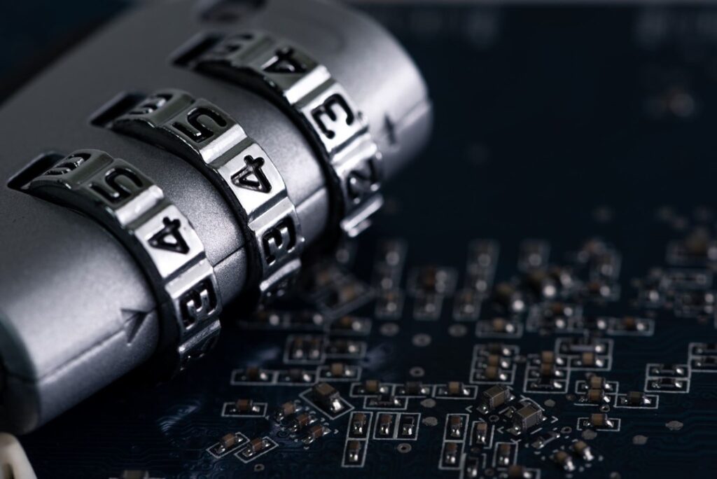 Combination padlock with digital data in the background, representing cyber security